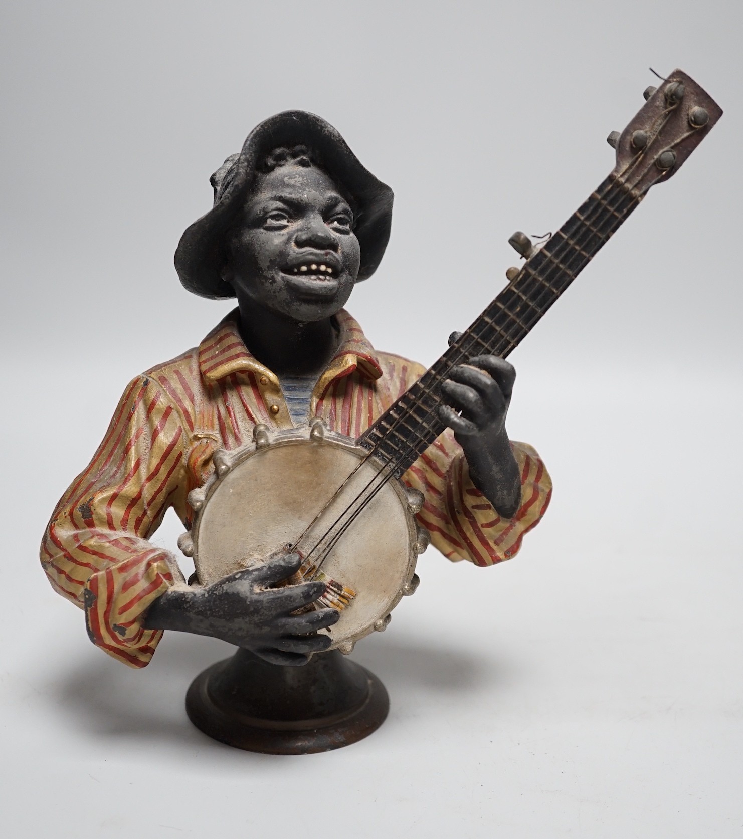 After Emile Coriolan Guillemin (1841-1907). A cold painted spelter model, ‘’The Banjo Player’’, 20cm